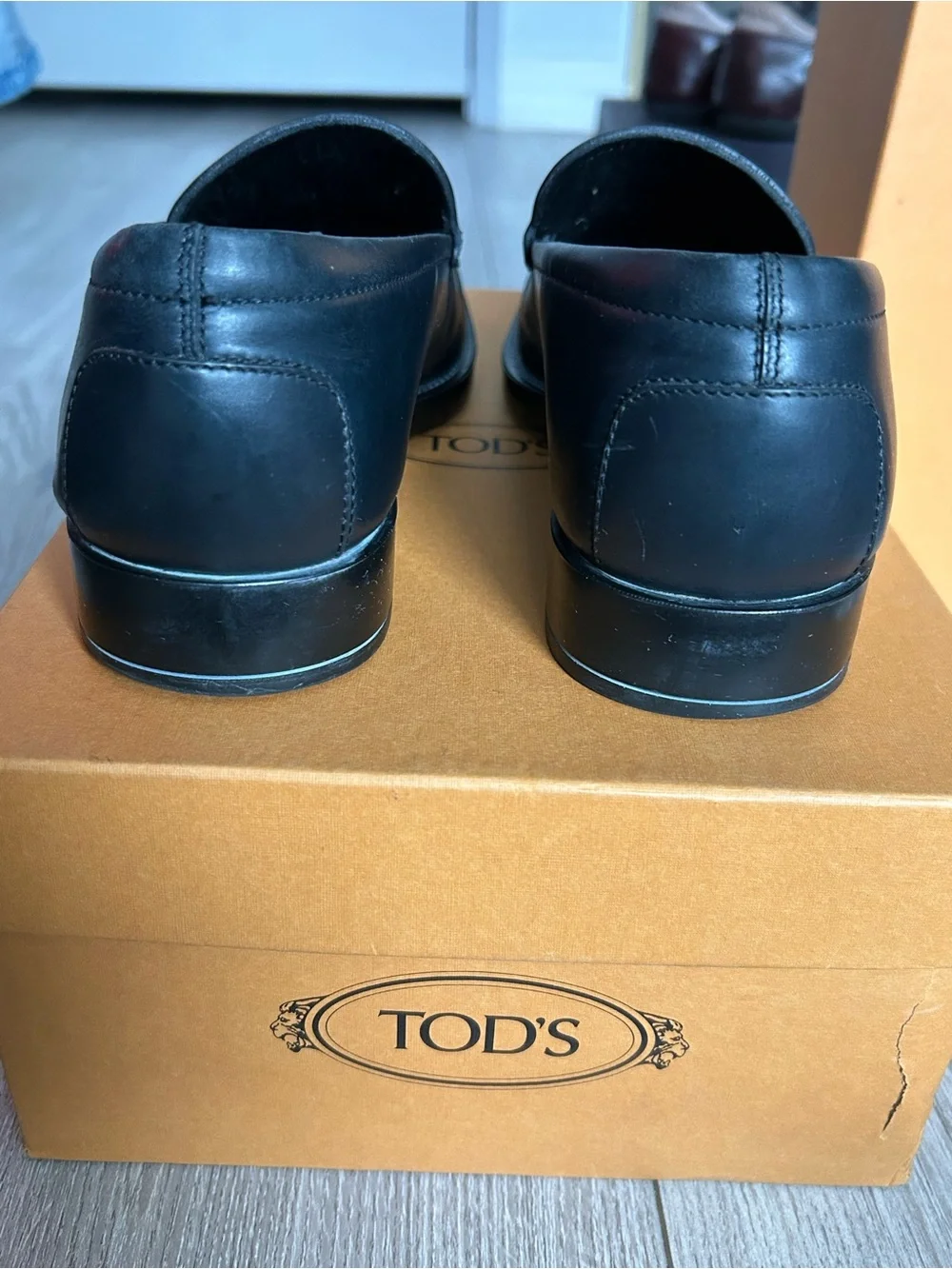 Tod's Black Leather Penny Loafers